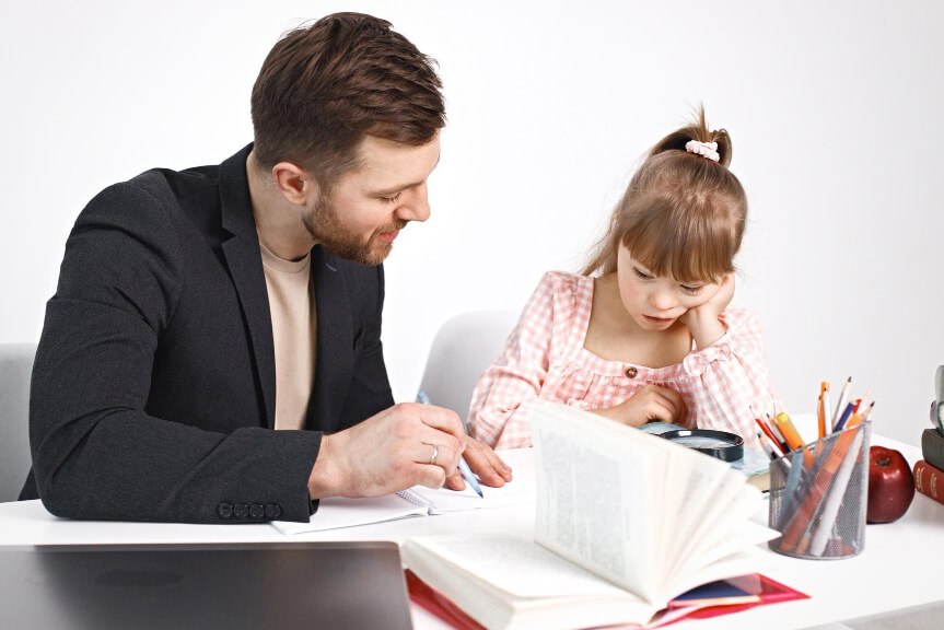 Father reviewing documents with young daughter during custody case meeting.