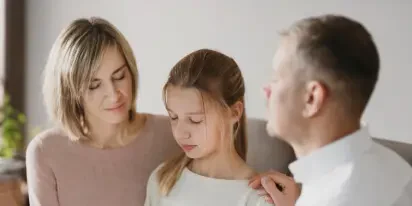 A child with her parents child-img  Topinka Law